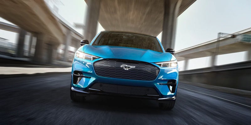 Ford Mustang Mach-E Driving below bridge